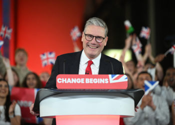 Britain's Labour Party leader Keir Starmer delivers a speech during a victory rally at the Tate Modern in London early on July 5, 2024. The UK's Labour Party swept to power after winning the country's general election, crossing the 326-seat threshold for a working majority in the House of Commons. (Photo by JUSTIN TALLIS / AFP)