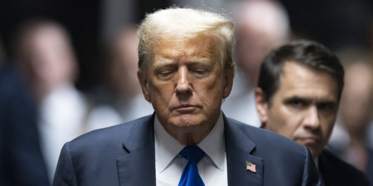 NEW YORK, NEW YORK - MAY 30: Former U.S. President Donald Trump departs the courtroom after being found guilty on all 34 counts in his hush money trial at Manhattan Criminal Court on May 30, 2024 in New York City. The former president was found guilty on all 34 felony counts of falsifying business records in the first of his criminal cases to go to trial. Trump has now become the first former U.S. president to be convicted of felony crimes.   Justin Lane-Pool/Getty Images/AFP (Photo by POOL / GETTY IMAGES NORTH AMERICA / Getty Images via AFP)