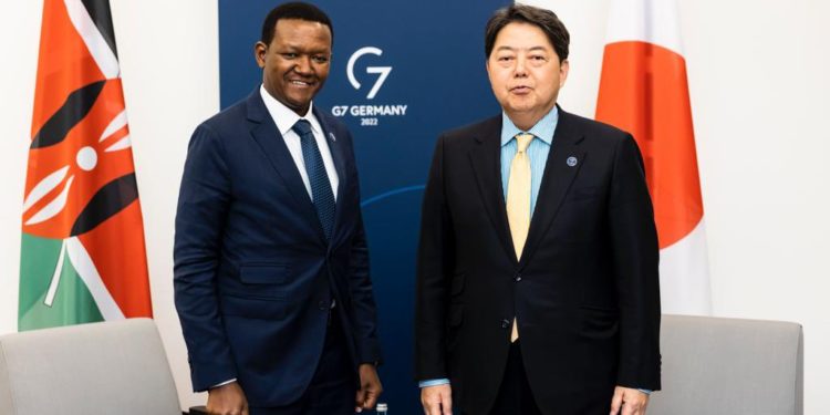 Alfred Mutua alongside Japanese Foreign Minister Yoshimasa Hayashi