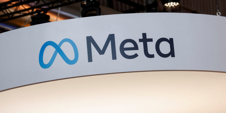 FILE PHOTO: A logo of Meta Platforms Inc. is seen at its booth, at the Viva Technology conference dedicated to innovation and startups, at Porte de Versailles exhibition center in Paris, France June 17, 2022. REUTERS/Benoit Tessier/File Photo