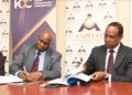 KDC Director General Mr. Christopher Huka and Capital Markets Authority (CMA) Chief Executive Officer Mr. Wyckliffe Shamiah during the signing of the Memorandum of Understanding.