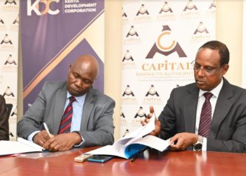 KDC Director General Mr. Christopher Huka and Capital Markets Authority (CMA) Chief Executive Officer Mr. Wyckliffe Shamiah during the signing of the Memorandum of Understanding.