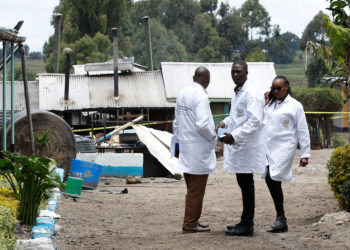 Directorate of Criminal Investigations (DCI) officers work at the Hillside Endarasha Academy, following a fatal fire which killed and injured several pupils, in Kieni, Nyeri County, Kenya, September 6, 2024. REUTERS/Monicah Mwangi