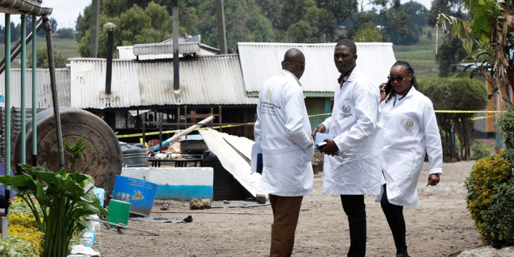 Directorate of Criminal Investigations (DCI) officers work at the Hillside Endarasha Academy, following a fatal fire which killed and injured several pupils, in Kieni, Nyeri County, Kenya, September 6, 2024. REUTERS/Monicah Mwangi