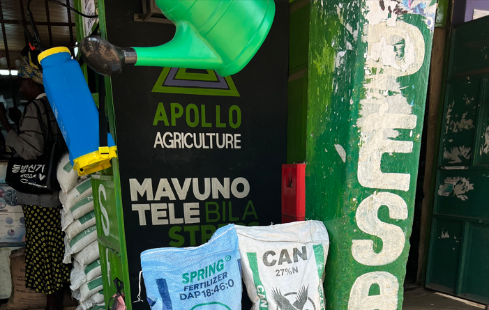 Fertilizer distribution agent Apollo displays products in a Nairobi retail shop