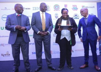 From left, Principal Secretary Ministry of ICT Jerome Ochieng, Cabinet Secretary Ministry of Labour & Youth Affairs, Simon Chelugui and Safaricom PLC CEO Peter Ndegwa look on as Sylvia Wangari takes them through a digital concept. This was during the launch of the Industry Digital talent programme at the Safaricom offices.