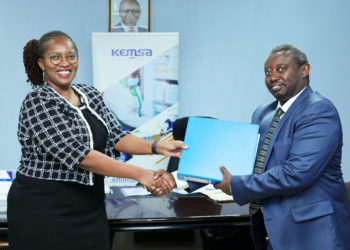 KEMSA Chief Executive Officer Terry Ramadhani receiving the instruments of office from immediate Acting CEO Mr John Kabuchu