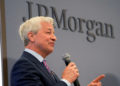 FILE PHOTO: JP Morgan CEO Jamie Dimon delivers a speech during the inauguration the new French headquarters of JP Morgan bank in Paris, France June 29, 2021.  Michel Euler/Pool via REUTERS