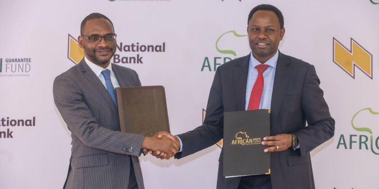 Managing Director, National Bank Kenya, Peter Kioko (RIGHT) and Group Chief Executive Officer, African Guarantee Fund, Jules Ngankam