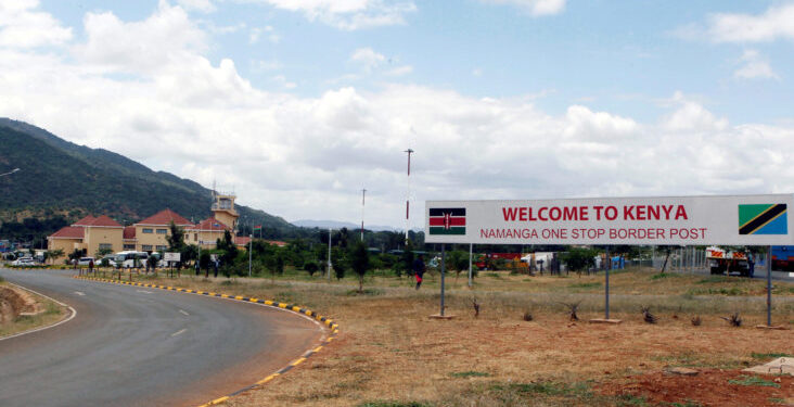 A signage is seen at the border crossing point between Kenya and Tanzania in Namanga, Tanzania July 19, 2019. Picture taken July 19, 2019. REUTERS/Njeri Mwangi - RC1B24DD7490