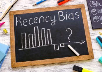 A Small blackboard with chart about recency bias.