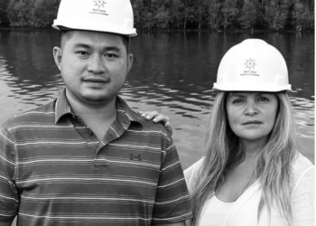 Welly Chandra, the son of Liu Chandra, with his attorney Monica R. Kelly at Liu Chandra’s Gas Factory.