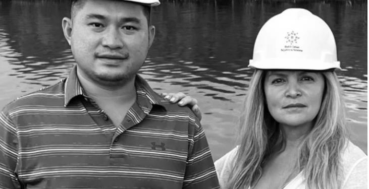 Welly Chandra, the son of Liu Chandra, with his attorney Monica R. Kelly at Liu Chandra’s Gas Factory.