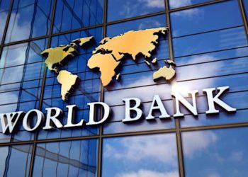 World Bank on glass building. Mirrored sky and city modern facade. Global capital, business, finance, economy, banking and money concept 3D rendering animation.