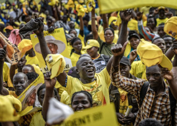 Supporters of Ugandas incumbent president and National Resistance Movement (NRM) presidential candidate Yoweri Museveni celebrate during a party gathering for the announcement of final results for the 2026 Ugandan presidential election at Lugogo Grounds in Kampala on January 17, 2026. Uganda's President Yoweri Museveni, 81, won a seventh term in office on on January 17, 2026 with 71.65 percent of the vote, the country's Electoral Commission said. (Photo by Luis TATO / AFP)