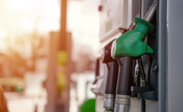 Close up of diesel and petrol fuel pistols at a gas station. The fuel crisis continues and the cost of fuel is going up