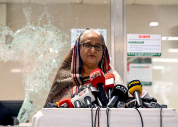 (FILES) In this handout photograph taken and released on July 25, 2024 by Bangladesh Prime Minister's Office, Prime Minister Sheikh Hasina addresses the media at a vandalized metro station in Mirpur, after the anti-quota protests. Thousands of Bangladeshi protesters stormed the palace of Prime Minister Sheikh Hasina in Dhaka on August 5, after a source told AFP she had fled mass demonstrations demanding she quit. (Photo by Bangladesh Prime Minister's Office / AFP) / XGTY / RESTRICTED TO EDITORIAL USE - MANDATORY CREDIT "AFP PHOTO /Bangladesh Prime Minister's Office" - NO MARKETING NO ADVERTISING CAMPAIGNS - DISTRIBUTED AS A SERVICE TO CLIENTS