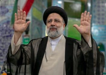 TEHRAN, IRAN - JUNE 18:  Ebrahim Raisi, a candidate in Iran's presidential elections waves to the media after casting his vote at a polling station on June 18, 2021, on the day of the Islamic republic's presidential election.  The country's incumbent president, Hassan Rouhani, is ineligible to run again after serving two terms in office. (Photo by Majid Saeedi/Getty Images)