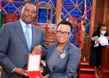 Speaker of the National Assembly Justin Muturi  [L] confers Deputy Clerk, National Assembly Sarah Kioko with Moran of the Burning Spear (MBS) in this photo taken on May 17, 2022 at parliament buildings that was awarded by President Uhuru Kenyatta in recognition of distinguished and outstanding service rendered to the nation and the word in various capacities and responsibilities.
Photo | Jeff Angote | Nation