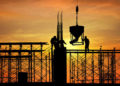 silhouette of construction worker on construction site