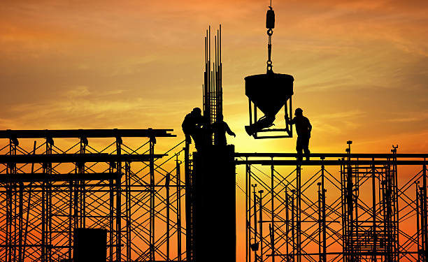 silhouette of construction worker on construction site